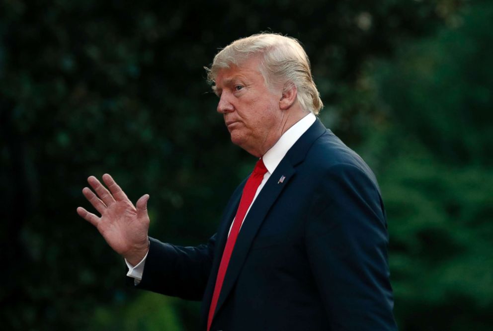 PHOTO:President Donald Trump waves after stepping off Marine One on the South Lawn of the White House, July 26, 2018.