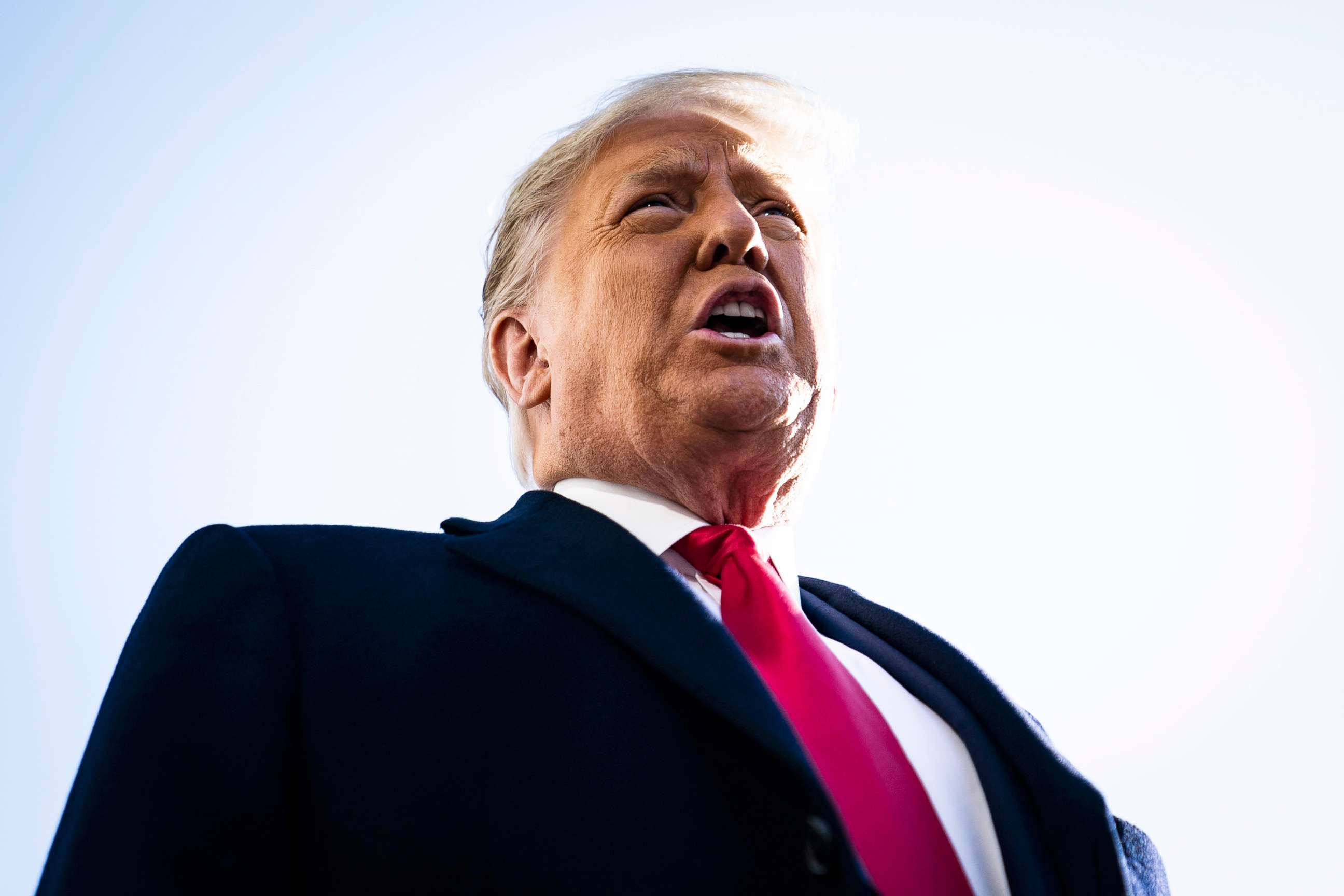 PHOTO: President Donald J. Trump stops to talk to reporters as he walks to board Marine One and depart from the South Lawn at the White House on Tuesday, Jan. 12, 2021