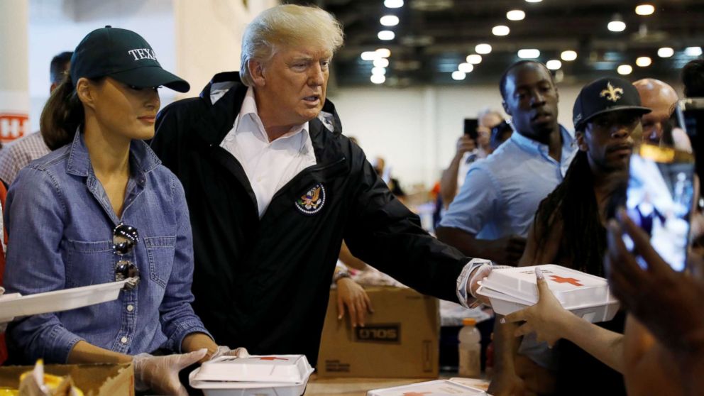 PHOTO: President Donald Trump and first lady Melania Trump help volunteers hand out meals during a visit with flood survivors of Hurricane Harvey at a relief center in Houston, Sept. 2, 2017. 