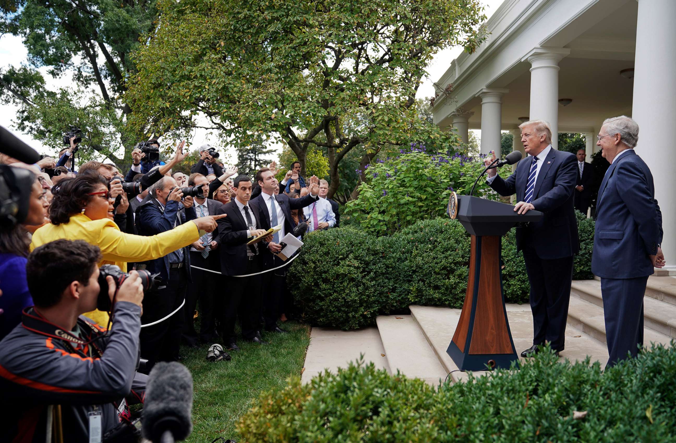 PHOTO: The Washington bureau chief for American Urban Radio Networks gestures as she asks questions to President Donald Trump and Senate Majority Leader Mitch McConnell of Ky., in the Rose Garden of the White House, Oct. 16, 2017.