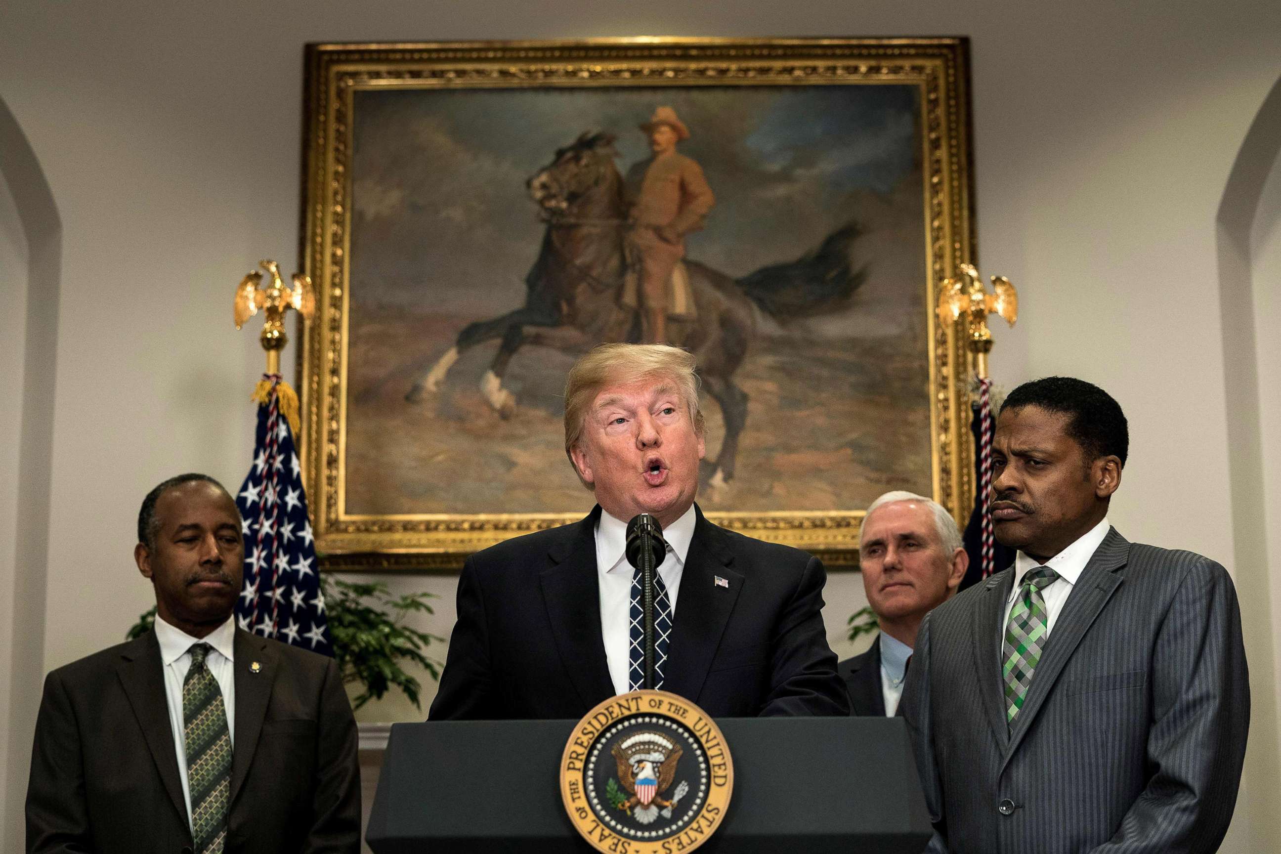PHOTO: Secretary of Housing and Urban Development Ben Carson, Vice President Mike Pence and Isaac Newton Farris Jr. listen while President Donald Trump speaks about Martin Luther King Jr. in the White House Jan. 12, 2018 in Washington.