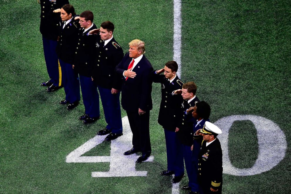 PHOTO: President Donald Trump on the field during the national anthem prior to the CFP National Championship presented by AT&amp;T between the Georgia Bulldogs and the Alabama Crimson Tide at Mercedes-Benz Stadium in Atlanta, Jan. 8, 2018.