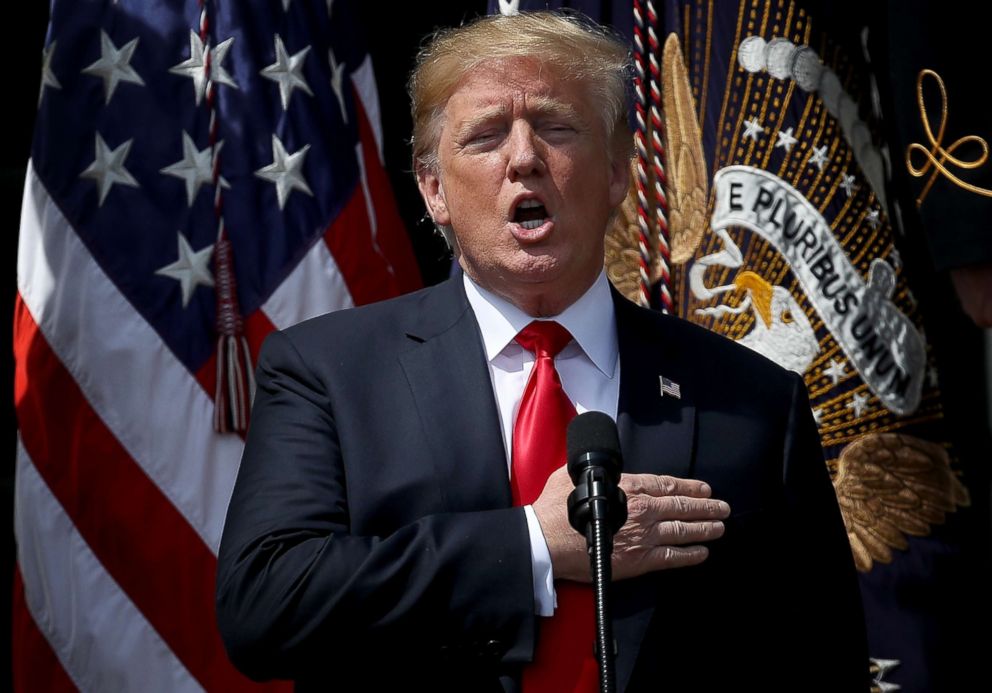 PHOTO: President Donald Trump sings the national anthem during a "Celebration of America" event on the south lawn of the White House on June 5, 2018 in Washington, D.C.