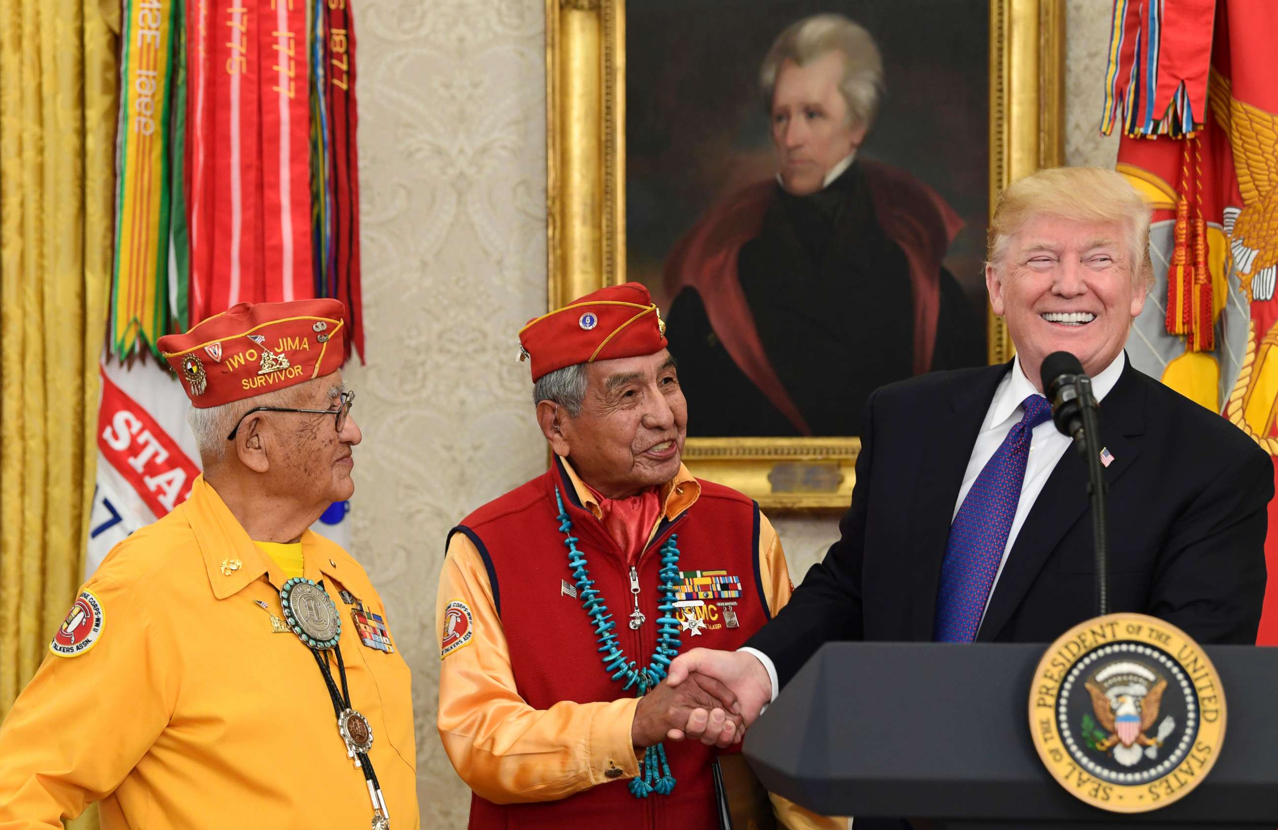 PHOTO: President Donald Trump, right, meets with Navajo Code Talkers Peter MacDonald, center, and Thomas Begay, left, in the Oval Office of the White House in Washington, Nov. 27, 2017.