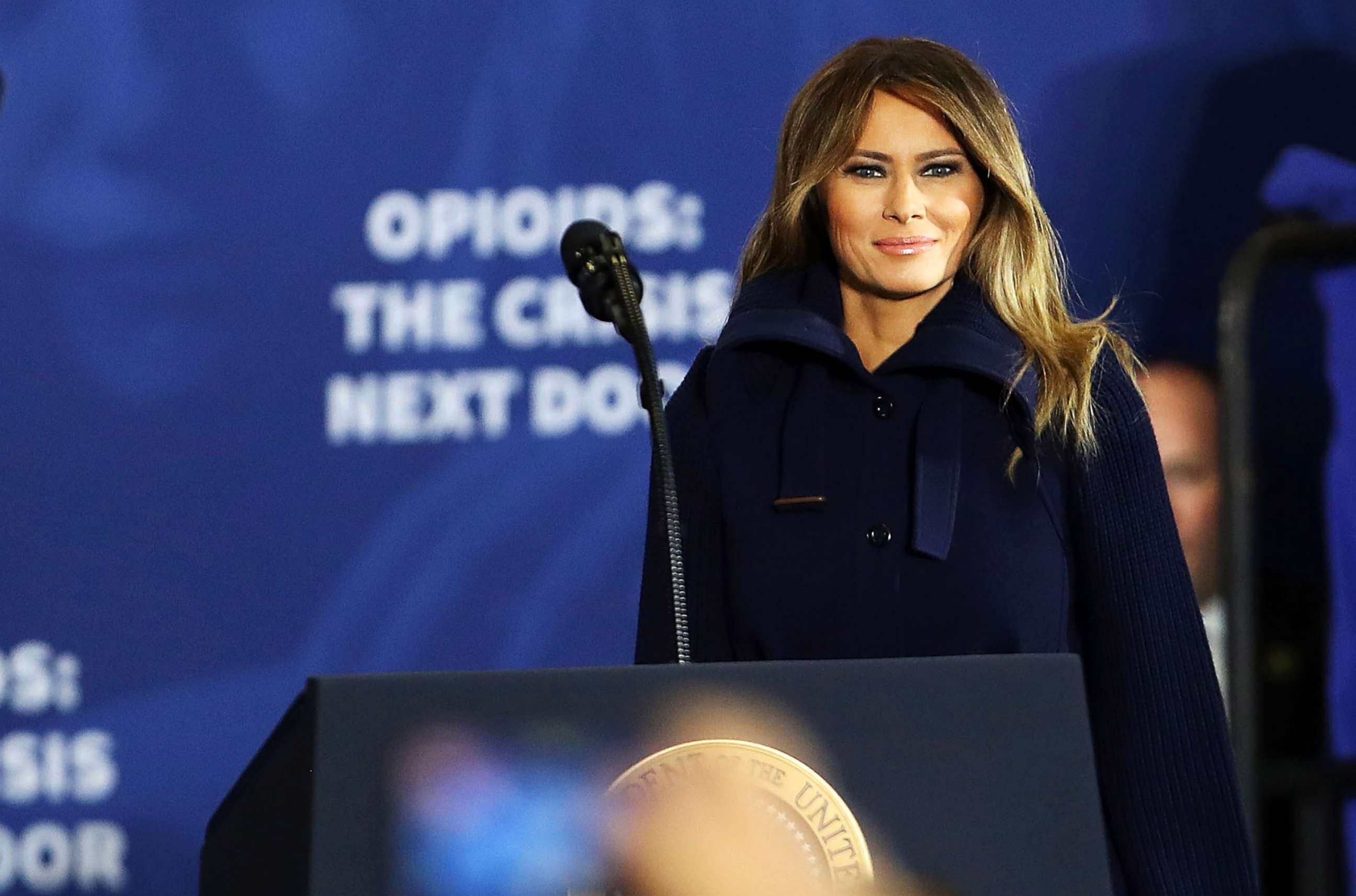 PHOTO: First lady Melania Trump walks onto the stage to introduce her husband and to speak about opioids at an event at Manchester Community College on March 19, 2018 in Manchester, N.H.