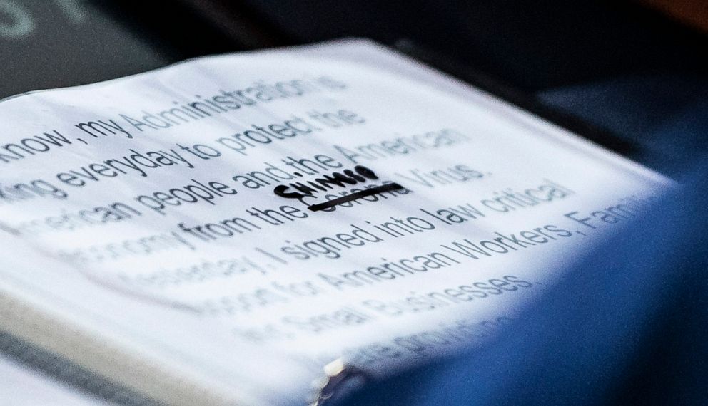 PHOTO: A close up of President Donald Trump's notes shows where the word corona in "Corona Virus" was crossed out and replaced with "Chinese" during a briefing at the White House on March 19, 2020, in Washington.