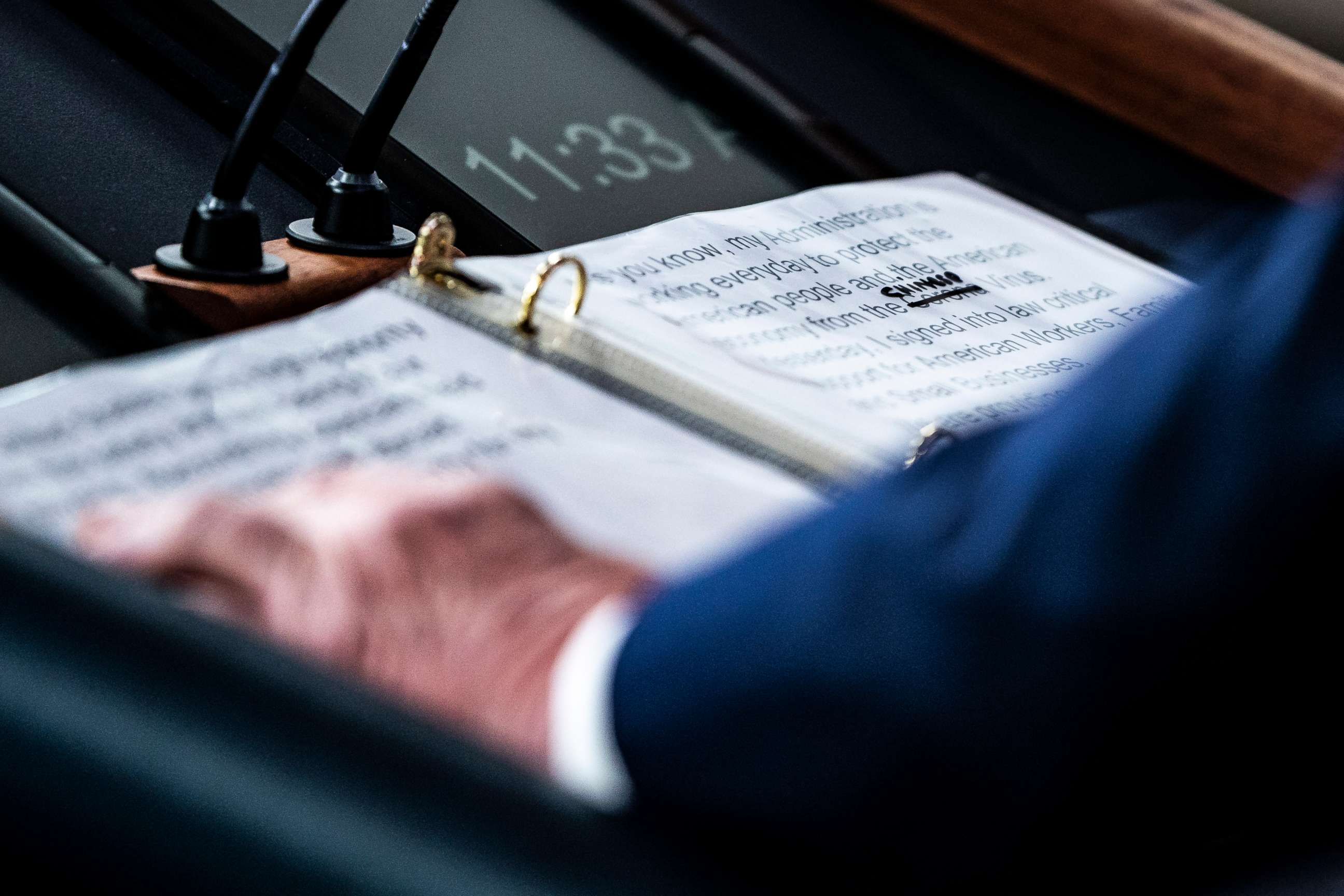 PHOTO: A close up of President Donald Trump's notes shows where the word corona in "Corona Virus" was crossed out and replaced with "Chinese" during a briefing at the White House on March 19, 2020, in Washington.