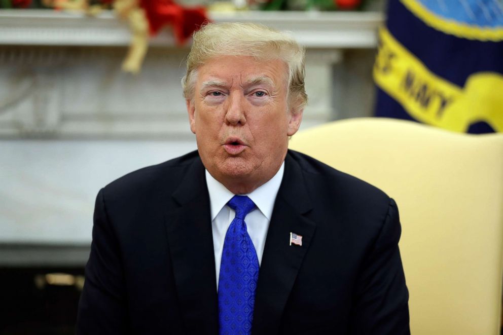 PHOTO: President Donald Trump speaks to the media in the Oval Office of the White House, Dec. 11, 2018, in Washington.