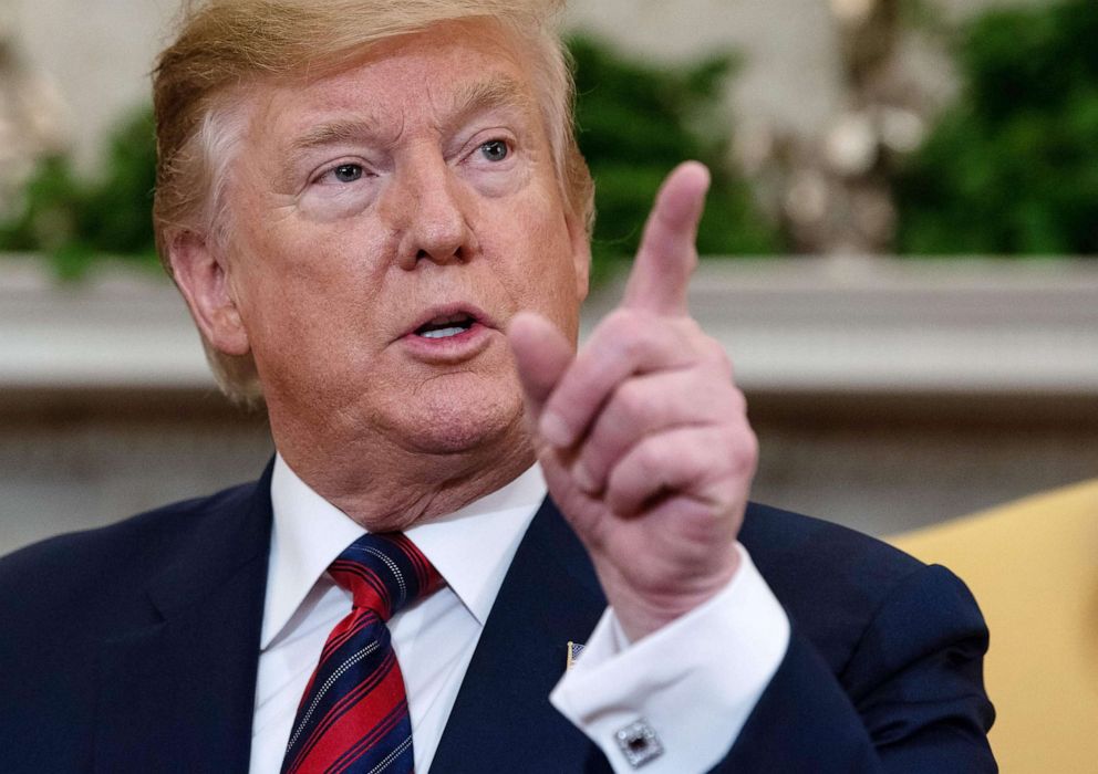 PHOTO: President Donald Trump gestures as he speaks speaks to the press during a meeting in the Oval Office at the White House in Washington, April 11, 2019.