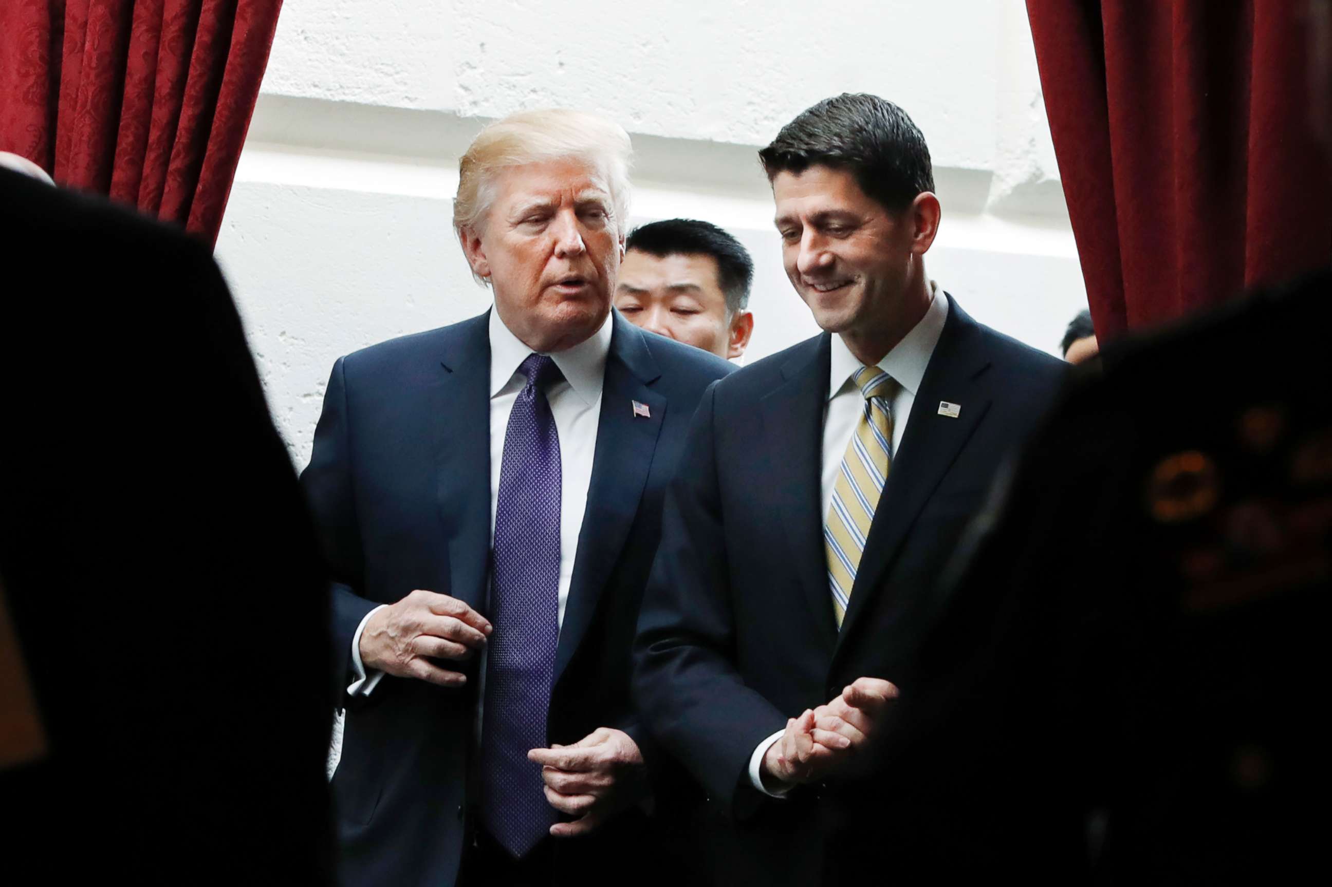 PHOTO: President Donald Trump walks with House Speaker Paul Ryan on  Nov. 16, 2017, as they leave a meeting with House Republicans on Capitol Hill.