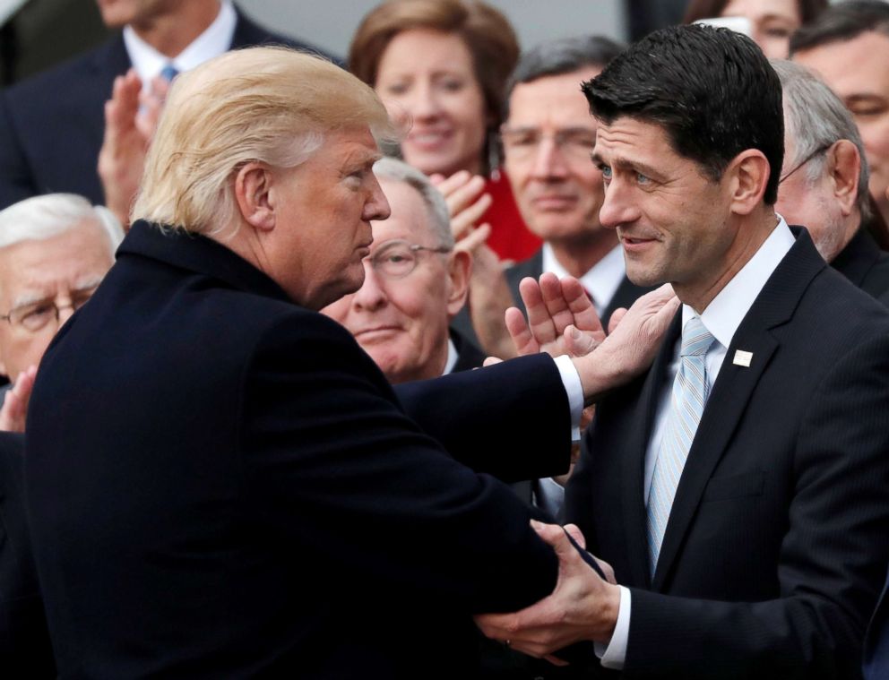 PHOTO: President Donald Trump shakes hands with Speaker of the House Paul Ryan (R) as he celebrates with Congressional Republicans after the U.S. Congress passed sweeping tax overhaul legislation, at the White House in Washington, D.C., Dec. 20, 2017.