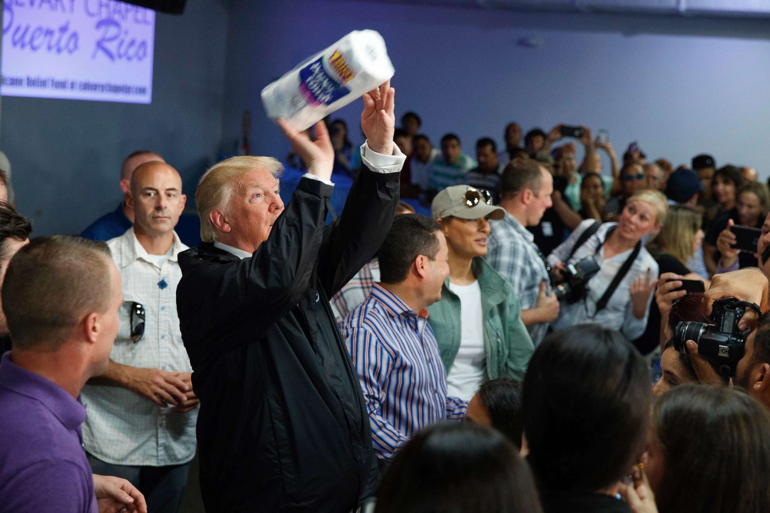 PHOTO: President Donald Trump tosses paper towels into a crowd as he hands out supplies at Calvary Chapel, Oct. 3, 2017, in Guaynabo, Puerto Rico. 