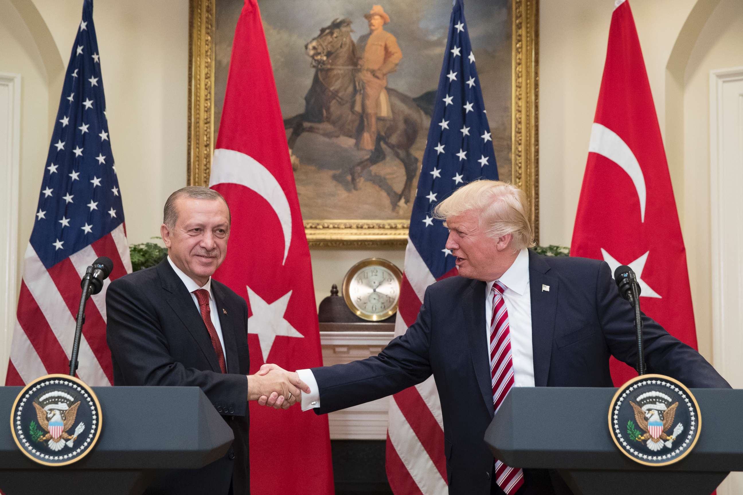 PHOTO: President Donald Trump shakes hands with President of Turkey Recep Tayyip Erdogan in the Roosevelt Room where they issued a joint statement following their meeting at the White House, May 16, 2017,  in Washington, DC.