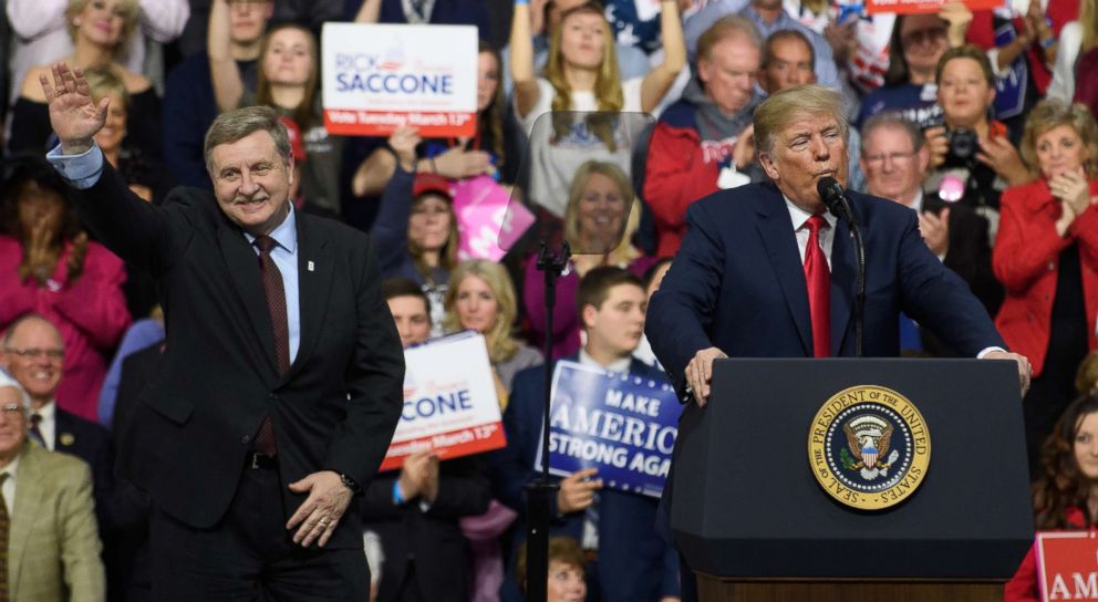 PHOTO: President Donald Trump with Rick Saccone speaks to supporters at the Atlantic Aviation Hanger, March 10, 2018 in Moon Township, Pa.