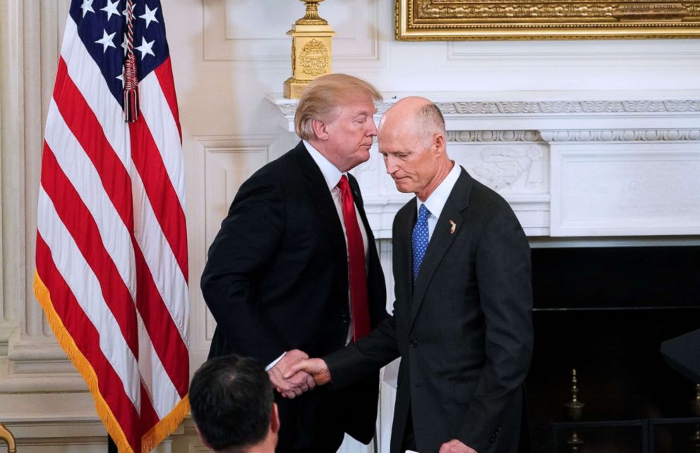 PHOTO: President Donald Trump shakes hands with Florida Gov. Rick Scott during the 2018 White House business session with state governors at the White House, Feb. 26, 2018.