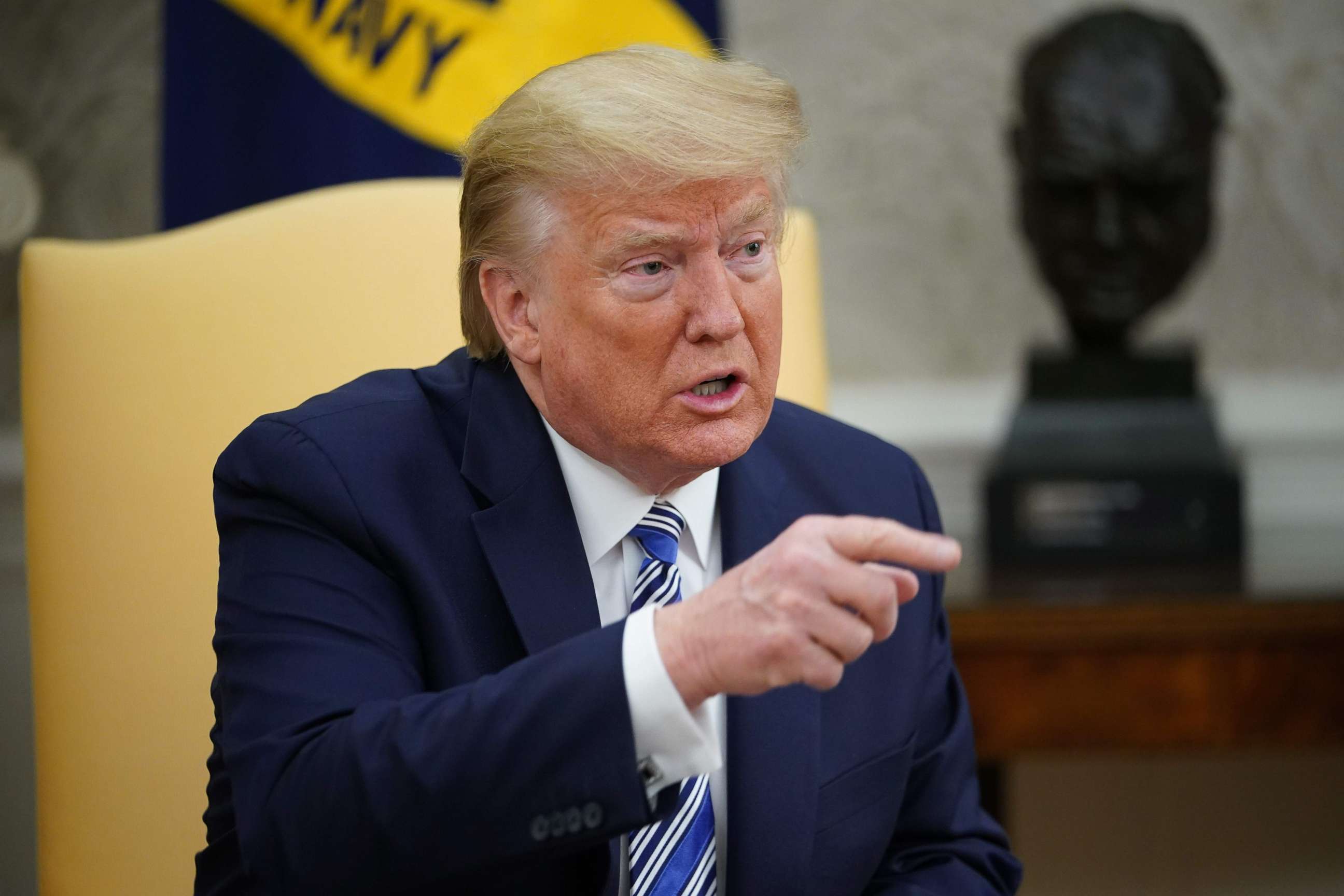 PHOTO: President Donald Trump speaks as he meets with Florida Governor Ron DeSantis in the Oval Office of the White House in Washington, April 28, 2020.