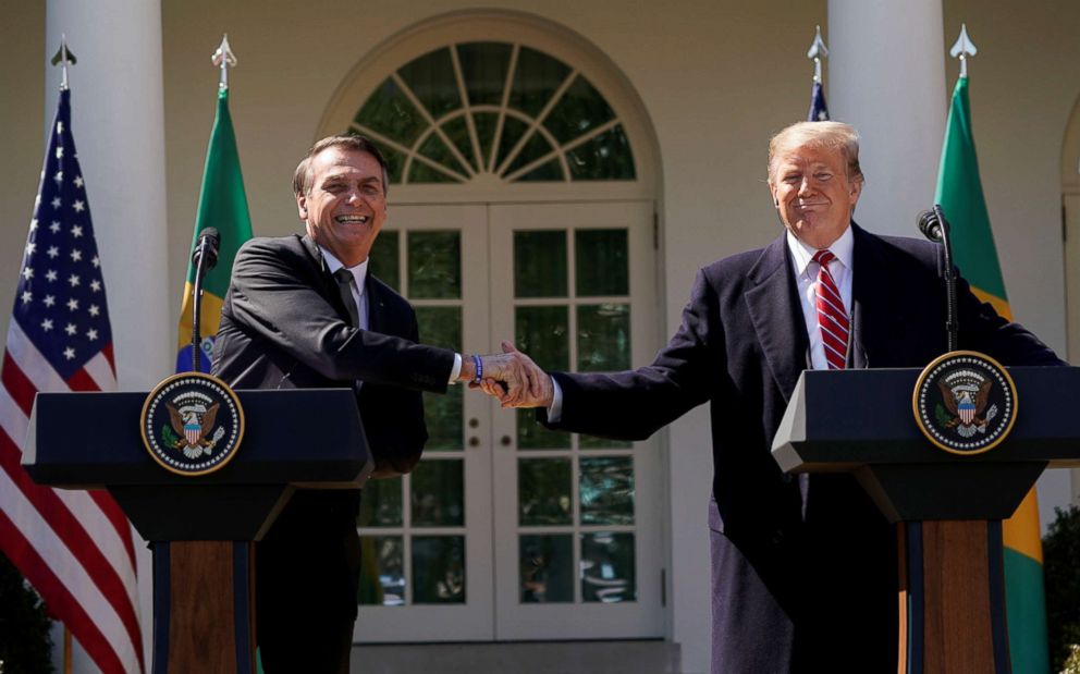 PHOTO: Brazil's President Jair Bolsonaro shakes hands with President Donald Trump at the conclusion of a joint news conference in the Rose Garden of the White House in Washington, March 19, 2019.