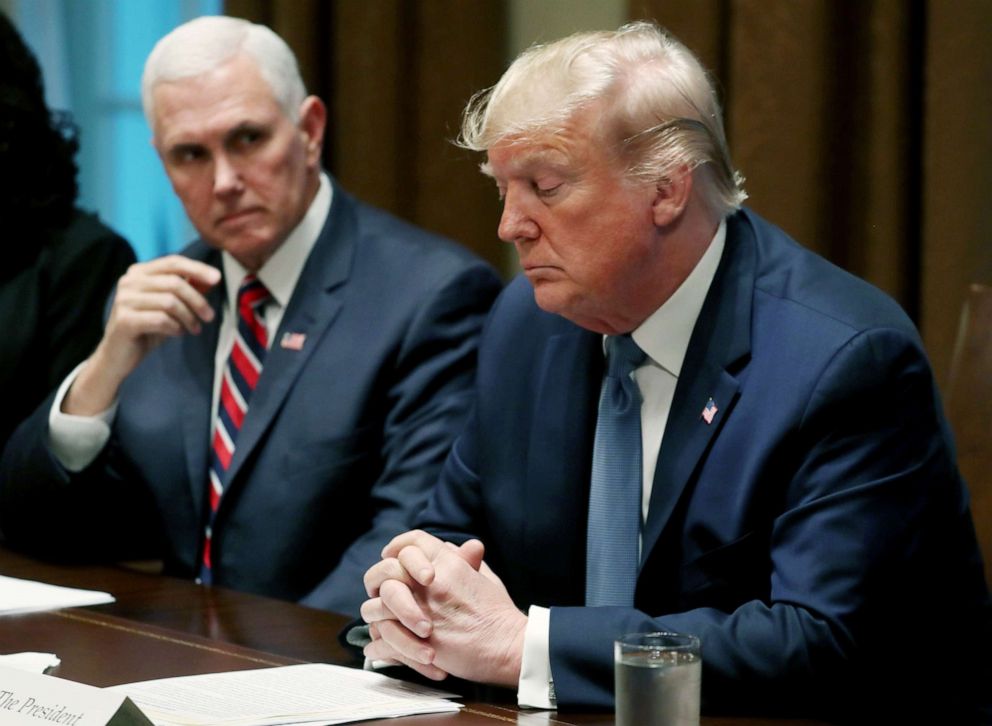 PHOTO: Vice President Mike Pence listens to President Donald Trump speak about a report released by Justice Department Inspector General Michael Horowitz in the Cabinet Room on Dec. 9, 2019, in Washington.