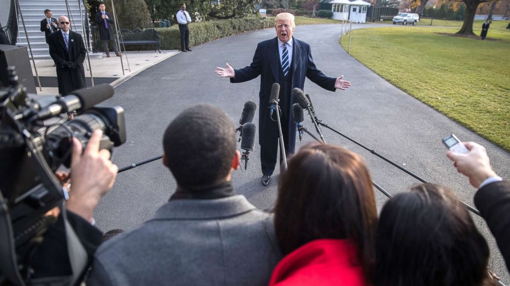 President Donald J. Trump delivers remarks as he walks to board Marine One on the South Lawn of the White House in Washington, Dec. 2, 2017. President Trump commented on the tax reform package passed by the Senate and on the guilty plea by former National Security Advisor Michael Flynn. 