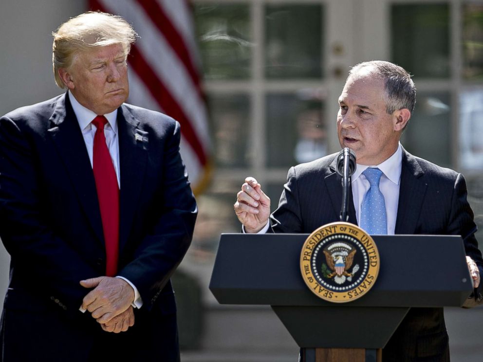 PHOTO: Scott Pruitt, administrator of the Environmental Protection Agency (EPA), speaks as President Donald Trump, left, listens during an announcement in the Rose Garden of the White House in Washington, D.C., June 1, 2017.