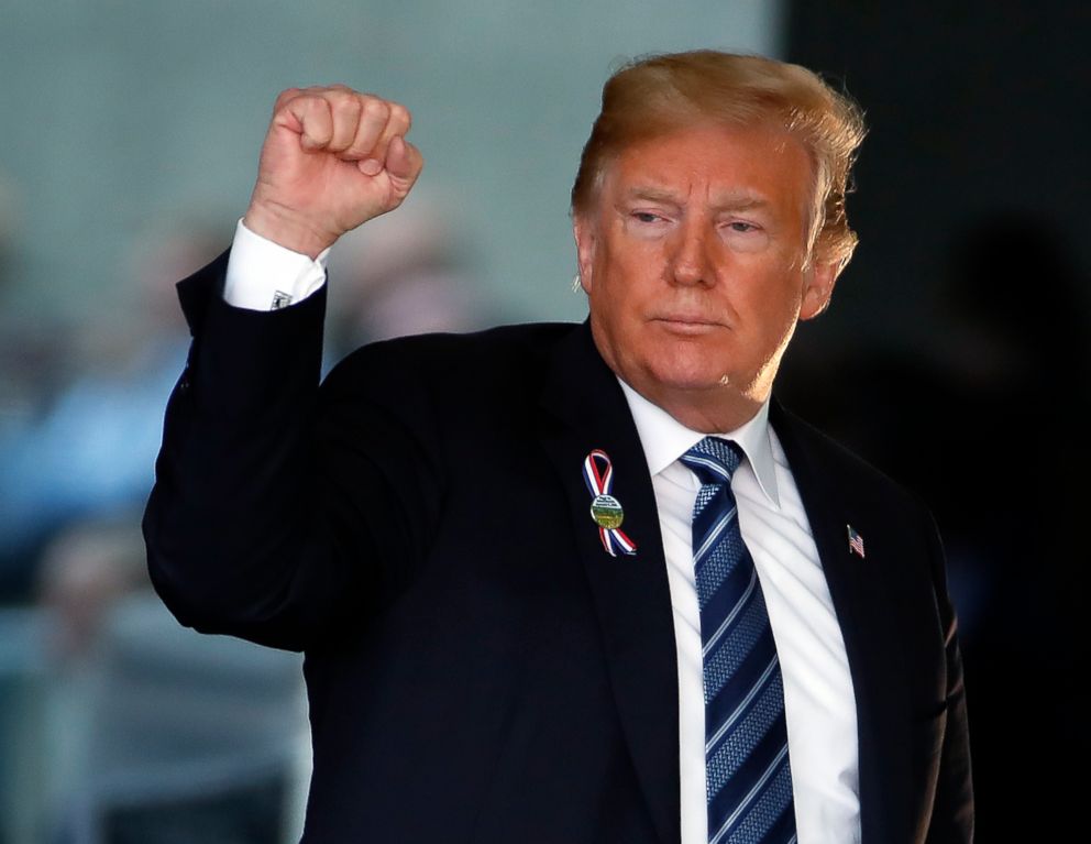 PHOTO: President Donald Trump makes a gesture as he leaves the stage after speaking at the September 11th Flight 93 Memorial Service in Shanksville, Pa., Sept. 11, 2018.