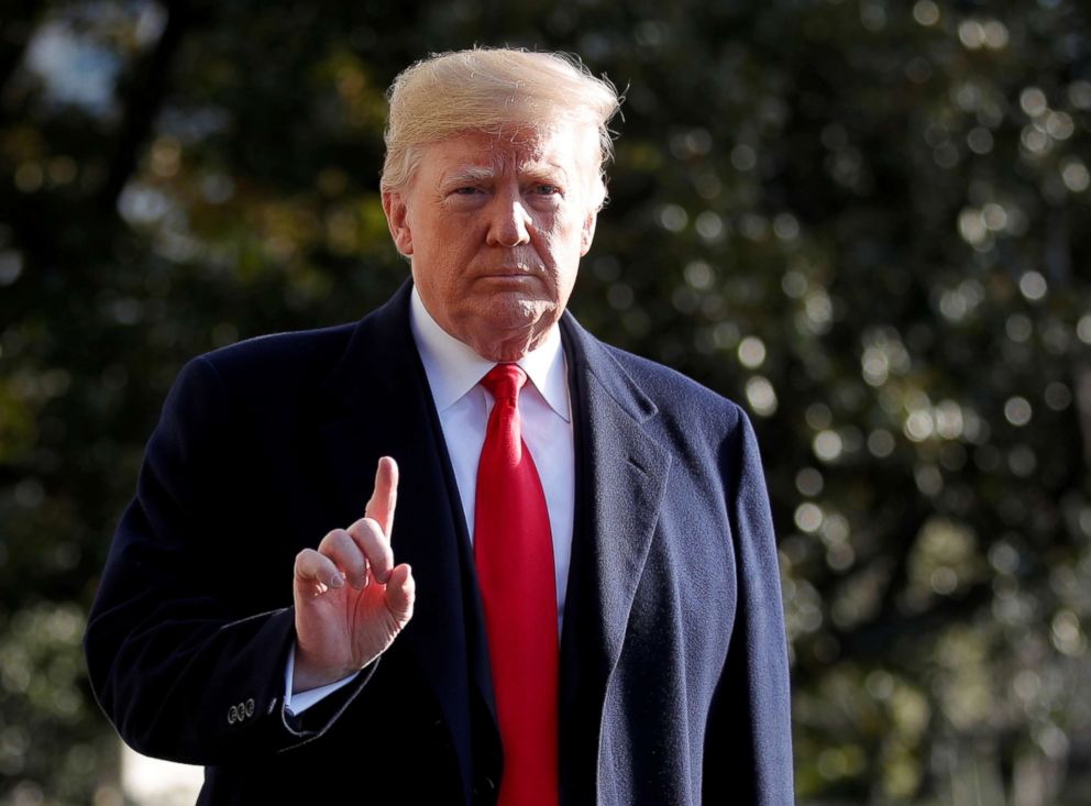 PHOTO: President Donald Trump walks to speak to the press before departing the South Lawn at the White House in Washington, Dec. 7, 2018.