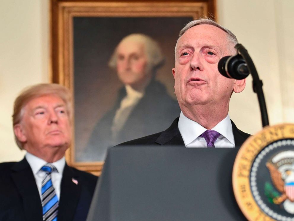 PHOTO: President Donald Trump looks on as Secretary of Defense James Mattis speaks about the spending bill at the White House, March 23, 2018.