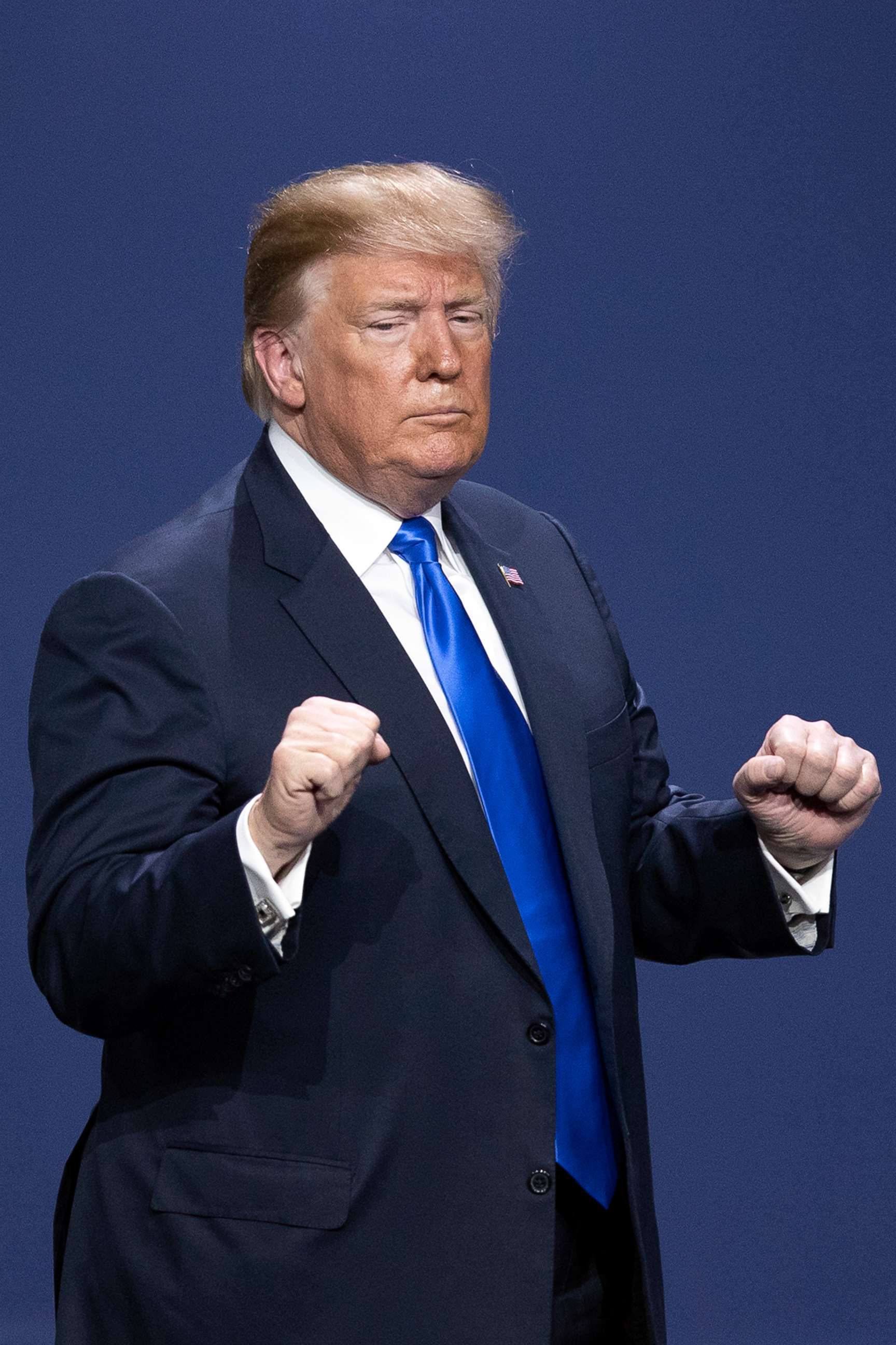 PHOTO: President Donald Trump gestures to the crowd after he delivered a speech during a Republican Jewish Coalition meeting in Las Vegas, April 6, 2019.