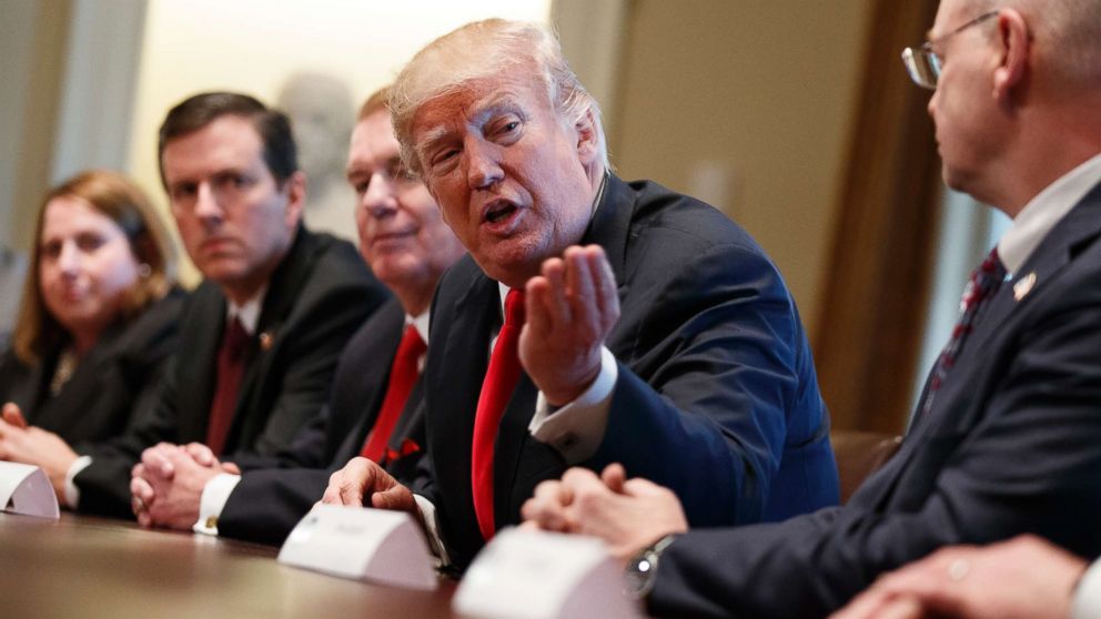 President Donald Trump speaks during a meeting with steel and aluminum executives in the Cabinet Room of the White House, March 1, 2018, in Washington. From left, Beth Ludwig of AK Steel, Roger Newport of AK Steel, John Ferriola of Nucor, Trump, and Dave Burritt of U.S. Steel Corporation. 