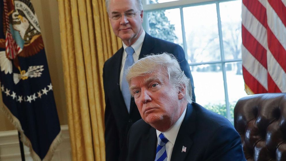 President Donald Trump with Health and Human Services Secretary Tom Price are seen in the Oval Office of the White House in Washington, D.C., March 24, 2017. 