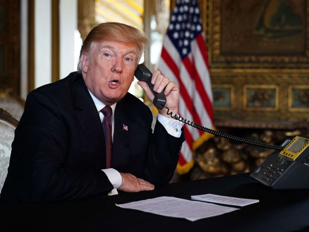 PHOTO: President Donald Trump speaks to members of the military via teleconference from his Mar-a-Lago resort in Palm Beach, Fla., on Thanksgiving Day, Nov. 22, 2018.