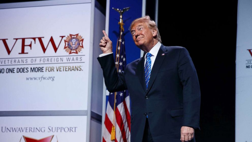 PHOTO: President Donald Trump reacts to music as he arrives to speak to the national convention of the Veterans of Foreign Wars, July 24, 2018, in Kansas City.