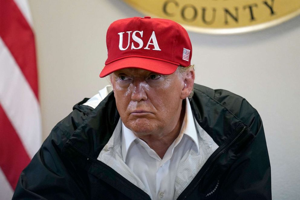 PHOTO: President Donald Trump listens during a briefing about Hurricane Laura with first responders at the emergency operations center Saturday, Aug. 29, 2020, in Orange, Texas.