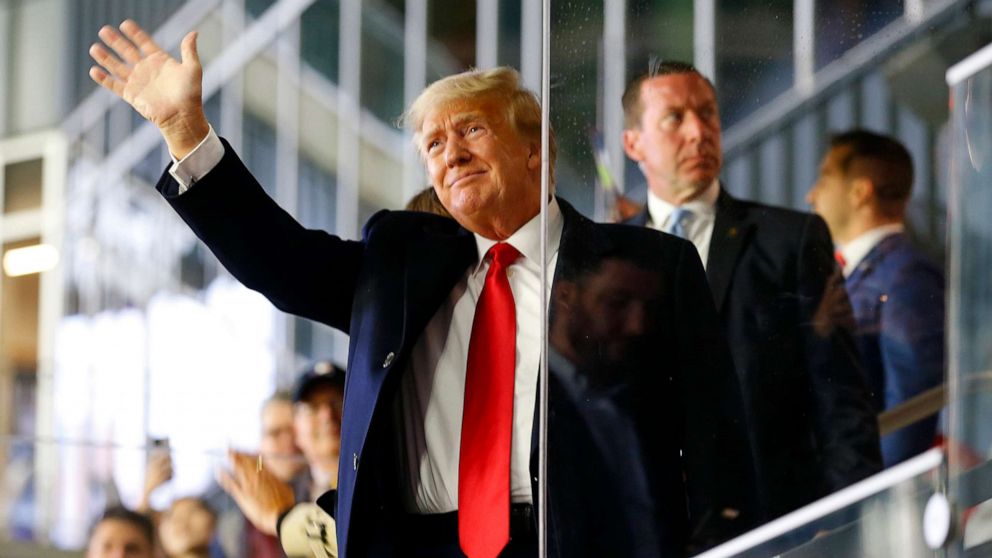 PHOTO: Former President Donald Trump waves prior to Game 4 of the World Series between the Houston Astros and the Atlanta Braves Truist Park on Oct. 30, 2021, in Atlanta