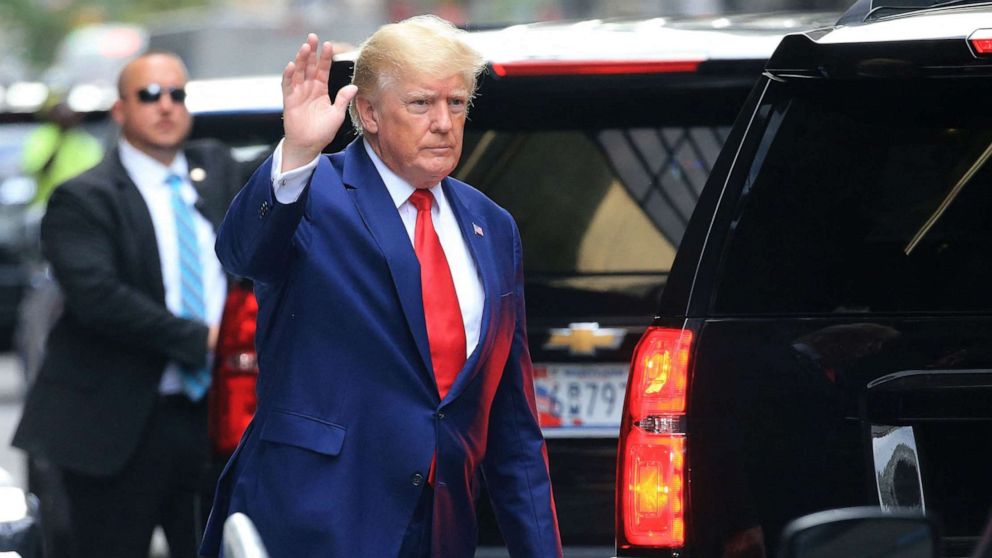 PHOTO: Former President Donald Trump waves while walking to a vehicle in New York City on Aug. 10, 2022.