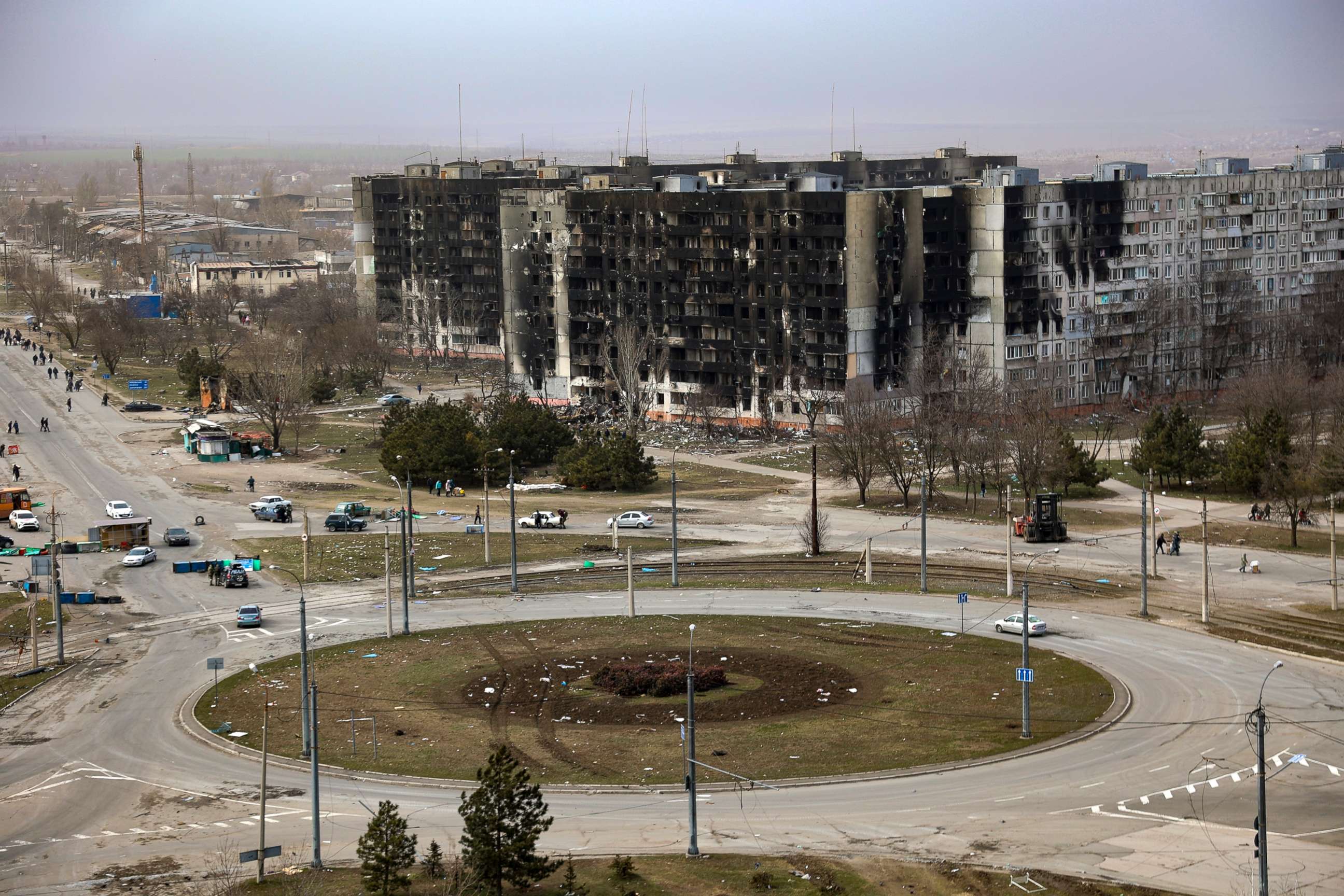 PHOTO: Damage is seen on apartment buildings after shelling from fighting on the outskirts of Mariupol, Ukraine, in territory under control of the separatist government of the Donetsk People's Republic, March 29, 2022. 
