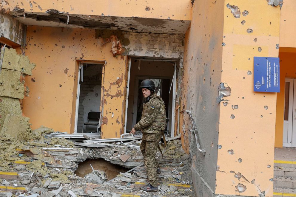PHOTO: A Ukrainian service member shows a kindergarten damaged by a military strike, as Russia's attack on Ukraine continues, in Sivierodonetsk, Luhansk region, Ukraine April 16, 2022. 