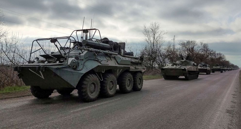 PHOTO: A Russian military convoy moves on a highway in an area controlled by Russian-backed separatist forces near Mariupol, Ukraine, April 16, 2022. 