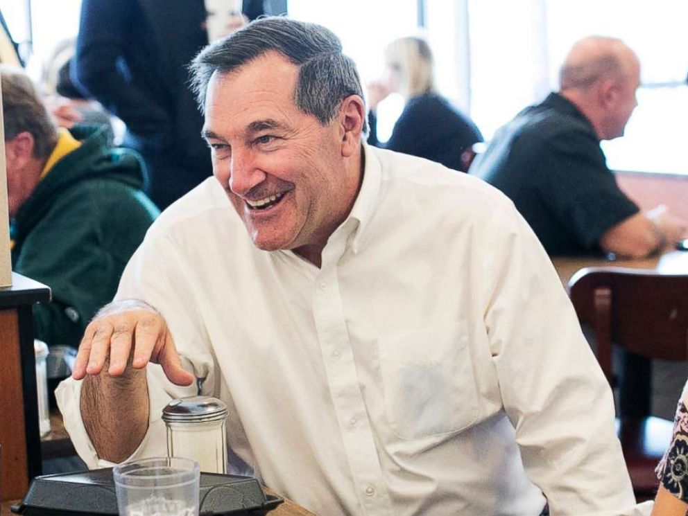PHOTO: Sen. Joe Donnelly (D-Ind.) talks with people at Shapiros Delicatessen in Indianapolis, Ind., Oct. 18, 2018.