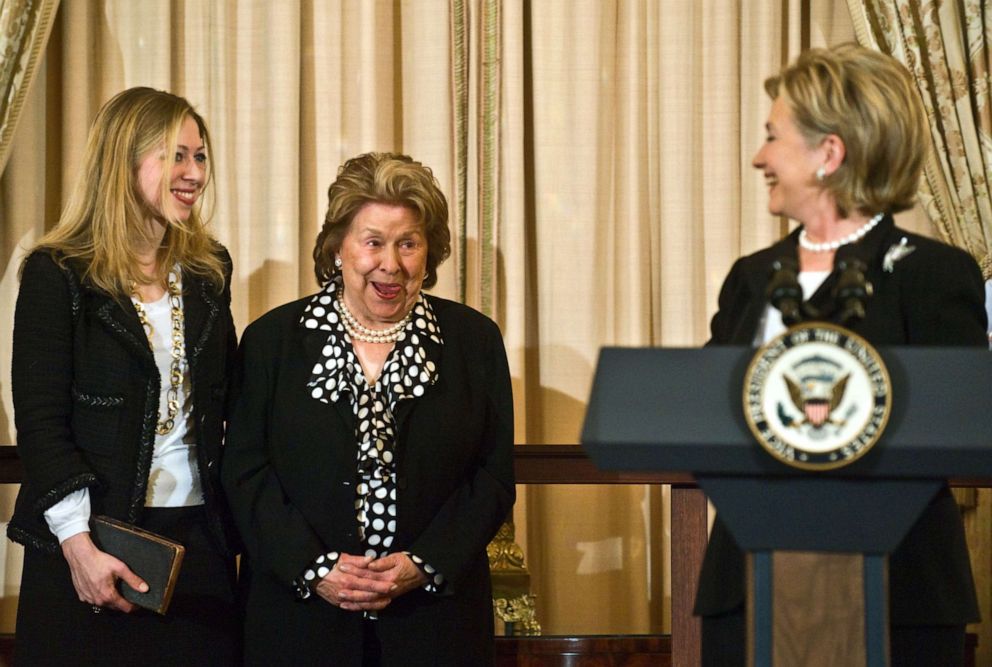 PHOTO: Secretary of State Hillary Clinton looks back at her mother Dorothy Rodham and daughter Chelsea as she speaks after being ceremonially sworn in at the State Department in Washington on Feb 2, 2009.