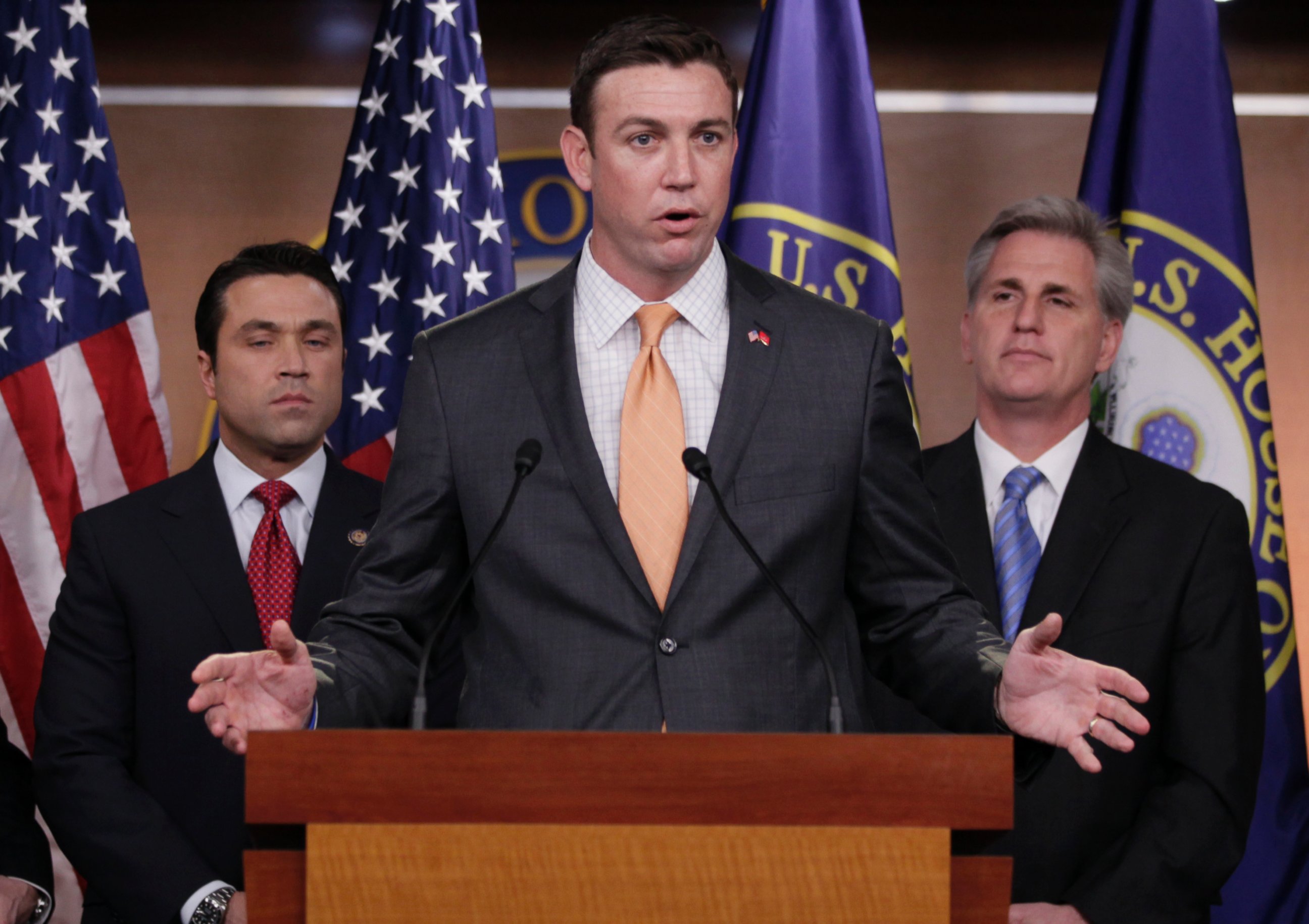 In this April 7, 2011 file photo, U.S. Rep. Duncan Hunter, R-Calif., center, speaks during a news conference on Capitol Hill.