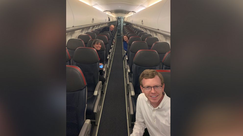 PHOTO: Rep. Dusty Johnson tweeted this photo of himself and 3 lawmakers from Minnesota flying to Washington, DC in order to vote on the $2 trillion coronavirus relief package.