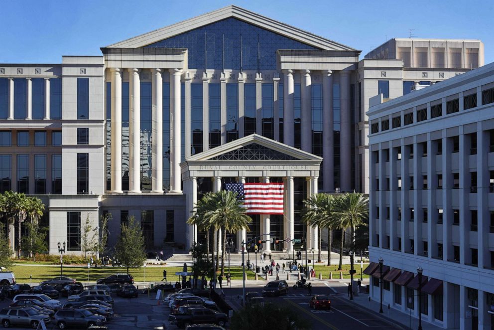 PHOTO: People gather enter the Duval County Courthouse in Jacksonville, Fla., Feb. 25, 2019.