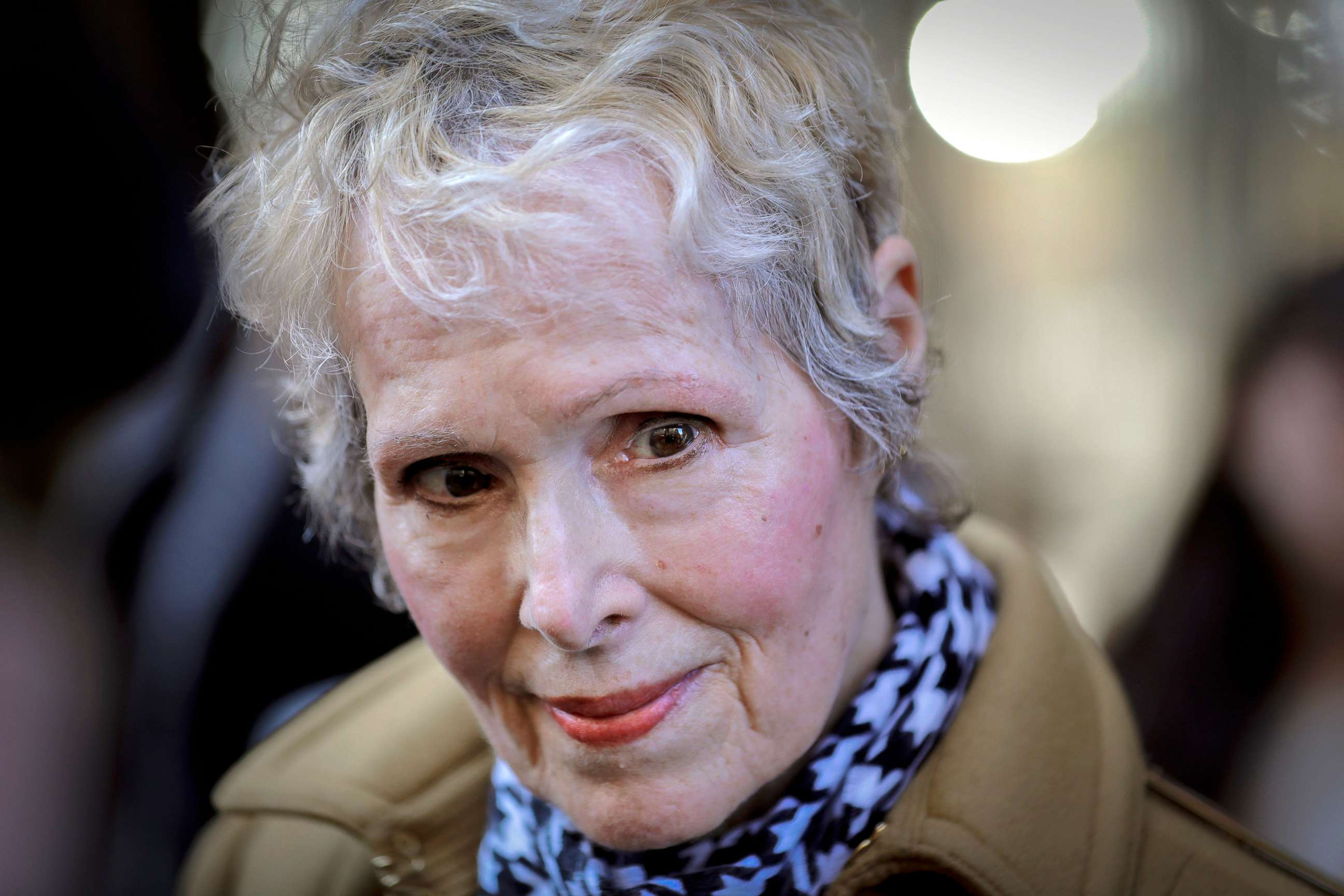 PHOTO: In this March 4, 2020, photo, E. Jean Carroll talks to reporters outside a courthouse in New York. 