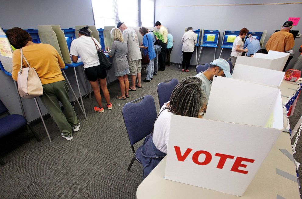 PHOTO: In this Oct. 20, 2016, file photo, people cast their ballots for the 2016 general elections at a crowded polling station as early voting begins in Carrboro, N.C.