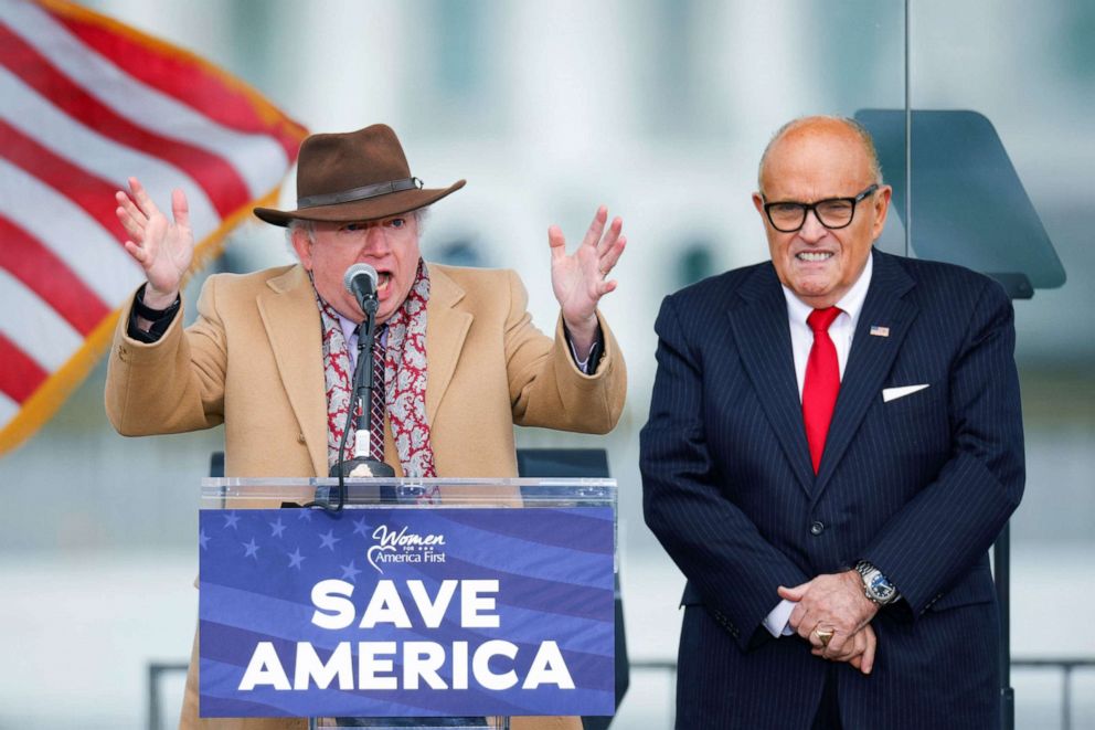 PHOTO: Chapman University law professor John Eastman, next to President Donald Trump's personal lawyer Rudy Giuliani, gestures as he speaks while Trump supporters gather ahead of his speech in Washington, D.C., Jan. 6, 2021.