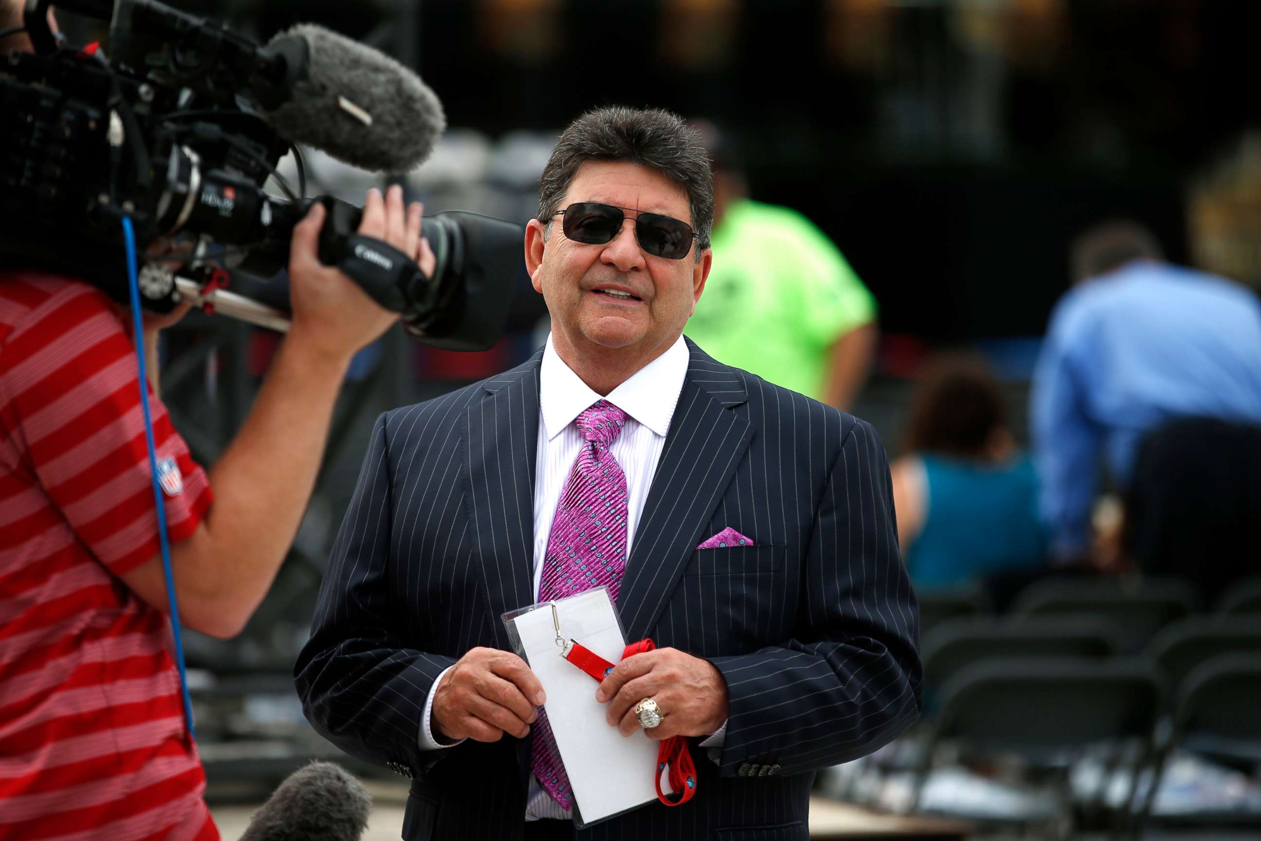 PHOTO: Former owner of the San Francisco 49ers Edward DeBartolo, Jr., is interviewed before the Pro Football Hall of Fame ceremony at Tom Benson Hall of Fame Stadium in Canton, Ohio, Aug. 8, 2015.