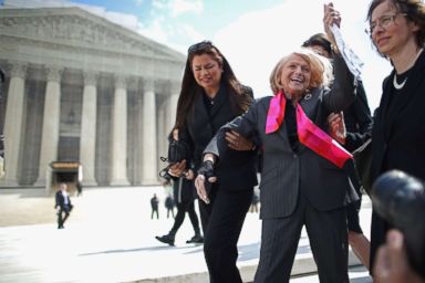 PHOTO: Edith Windsor, 83, acknowledges her supporters as she leaves the Supreme Court March 27, 2013 in Washington, DC.