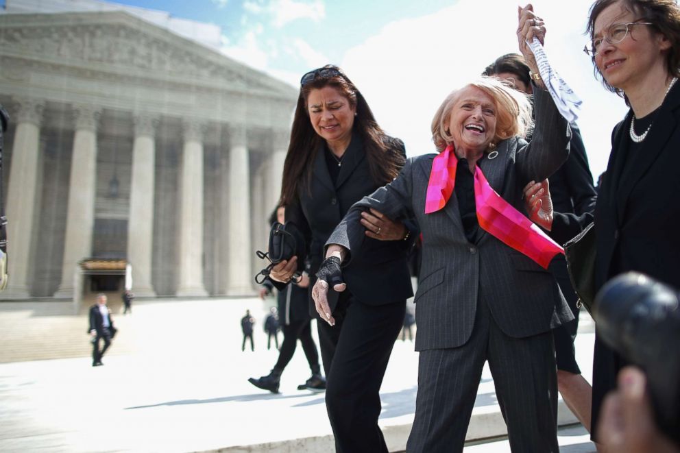 PHOTO: Edith Windsor, 83, acknowledges her supporters as she leaves the Supreme Court March 27, 2013 in Washington, DC.