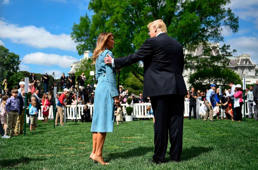 PHOTO:President Donald Trump holds the arm of First Lady Melania Trump during the annual White House Easter Egg Roll on the South Lawn of the White House, April 22, 2019. 